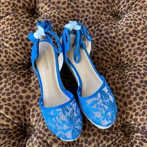 Brand new Covington Blue Lacey Wedges.